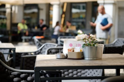 A table in outdoor cafe. Italy, Udine, August 2023