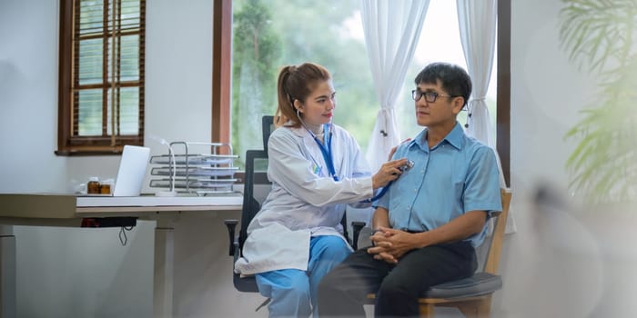 doctor discussion results or symptoms and gives a recommendation to a senior male patient, giving consultation during medical examination in clinic.