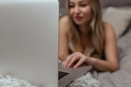 A beautiful, young girl shoots a webcam, works as a model. The concept of online flirting, sex on the Internet.