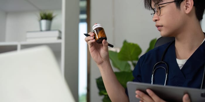 A diligent medical student analyzes medication, showcasing dedication to learning and patient safety.