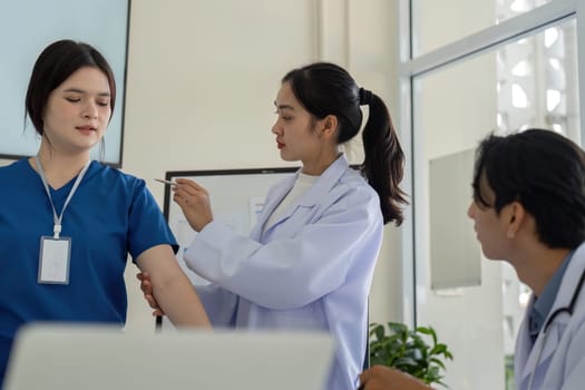 A nurse skillfully administers a vaccination to a patient, emphasizing the importance of preventive healthcare in a clinical environment.