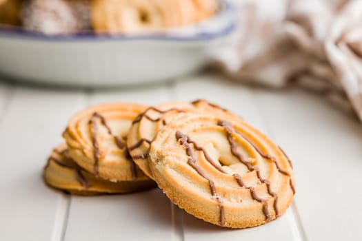 Sweet chocolate cookies on a white table.