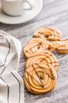 Sweet chocolate cookies on a kitchen table.