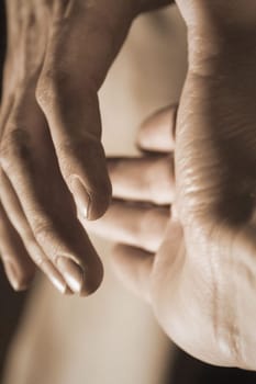 Business handshake in sepia