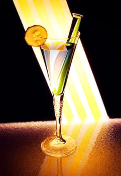Backlit glass with kiwi and test tube