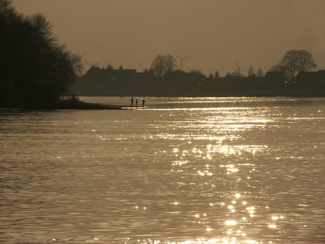 People,nature and technology,evening atmosphere on the Upper Elbe. Shot in March 2003 with a Minolta D7i