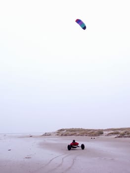 Dragon buggy rider on the beach