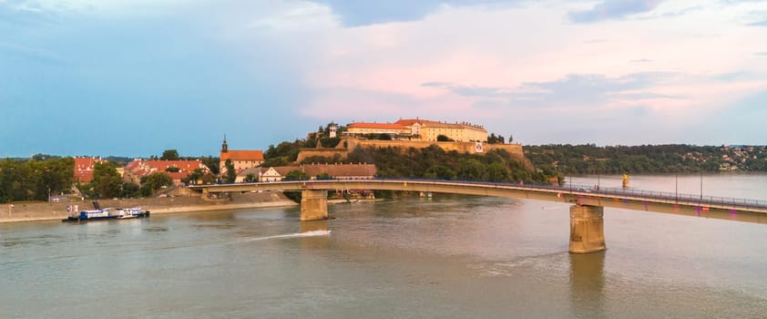 Aerial view of Petrovaradin fortress and bridge over Danube river in Novi Sad Serbia at sunset
