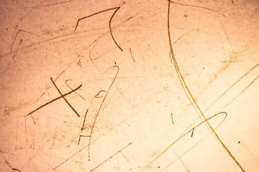 This is an artistic representation featuring scratches and lines that come together to create an abstract backdrop