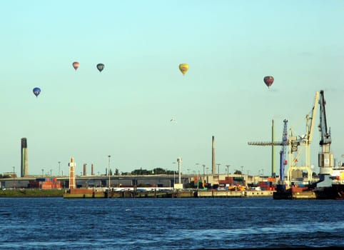 Hot air balloons over the harbour