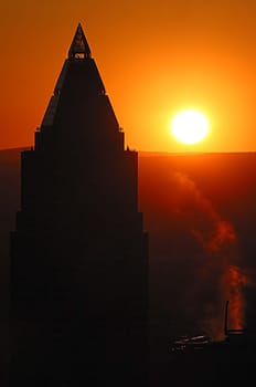 The Messeturm in Frankfurt from the visitor platform of the Maintower at sunset on September 19,2005 Canon EOS D60,100 - 400mm. L IS,800 ISO