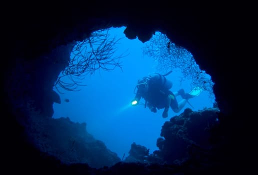 Divers at the cave entrance
