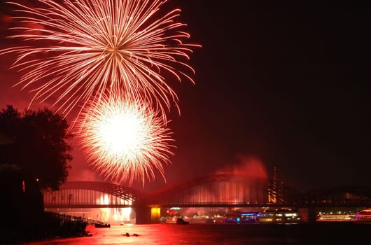 Taken during the fireworks display "Kölner Lichter"" in June 2004. Nikon D70,18-70."
