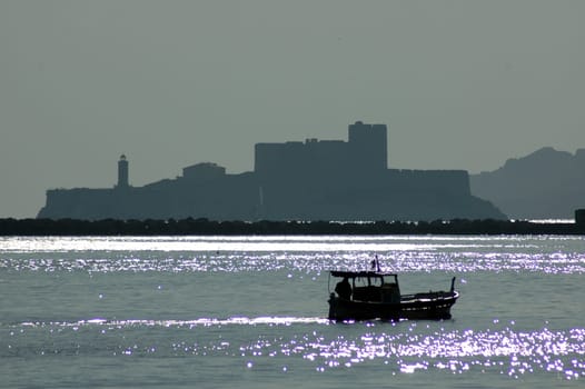The prison island in the background is the Chateau d'If,known from "The Count of Monte Cristo""."