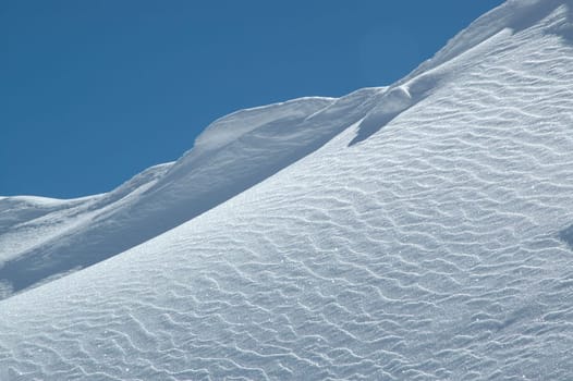 Taken at the Rothorn near Lenzerheide in Switzerland in March 2005. Nikon D70,Nikkor 18-70.