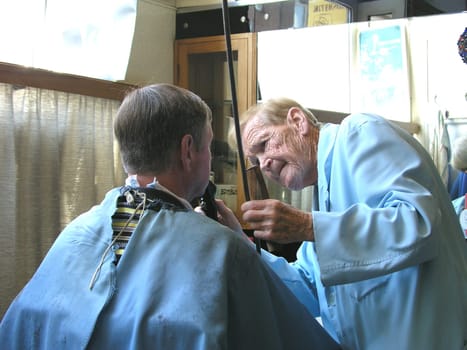 Kurt Ehleben.Probably the oldest,self-employed, master hairdressers who are still working  Schleswig-Holstein. He has been a master hairdresser since 1938 and has been self-employed for 55 years. He told me he was "29"" years old (92)."