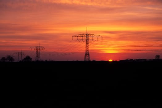 High-voltage current in the evening light