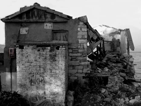 Taken on Samos,Greece in 1990 (slide scan) I converted the image to grayscale and left the electricity meter in color.