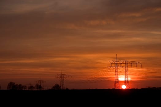 High-voltage current in the evening light