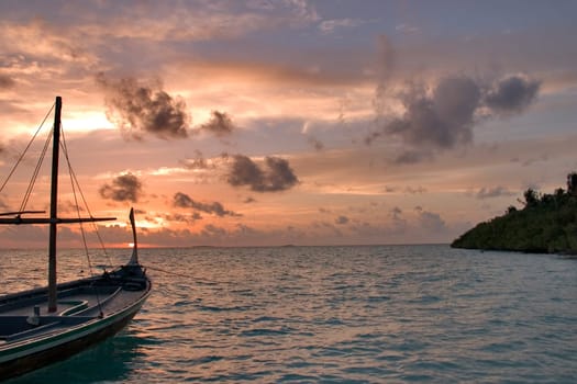 Dhoni at sunset,Maldives