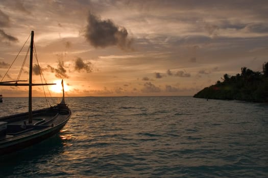 Dhoni at sunset,Maldives