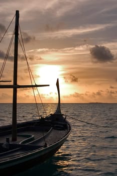 Dhoni at sunset,Maldives
