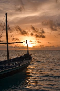 Dhoni at sunset,Maldives