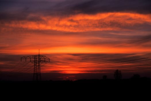 High-voltage current in the evening light