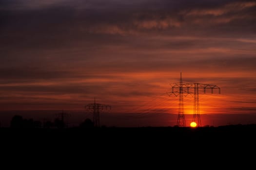 High-voltage current in the evening light