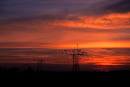 High-voltage current in the evening light