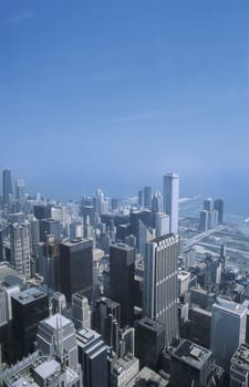 View of Chicago from the Sears Tower. There is still a lot of discussion about this title of tallest building,as the Petronas Towers include the tapered antennas,while the attached Sears Tower antenna does not count.