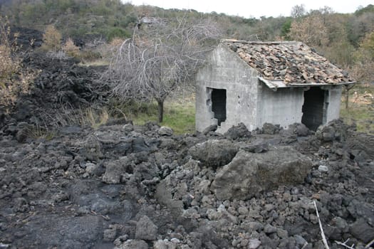 Lava field near Zafferano. The lava flow of the 1992 eruption stopped just before the village. Only a few cottages and,like here,a hut were destroyed.