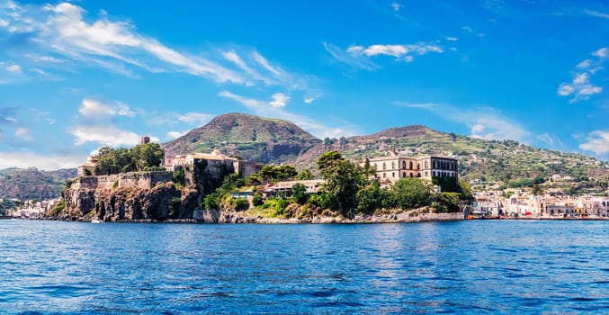 A small island in the middle of the Mediterranean Sea. Photo of a picturesque island surrounded by tranquil waters