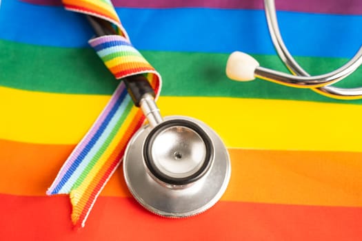 Stethoscope with heart and rainbow flag, symbol of LGBT pride month celebrate annual in June social, symbol of gay, lesbian, bisexual, transgender, human rights and peace.