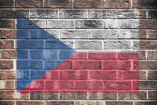 A Czech flag painted on brick wall background