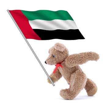 A United Arab Emirates UAE flag being carried by a cute teddy bear