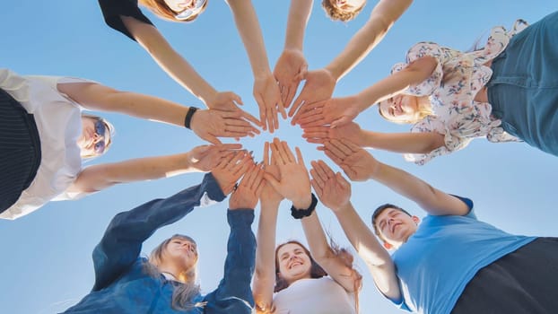 Seven boys and girls join hands as a sign of strong friendship