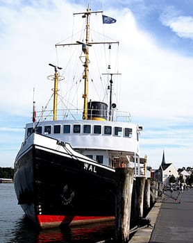 In 1938,the steamer "Wal"" was put into service at the Szczecin Oder Works for icebreaking services on the Kiel Canal. Photographer in the city harbour of Flensburg"