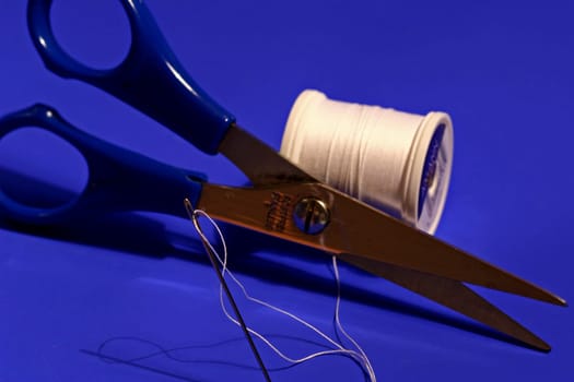 Needle,thread,scissors