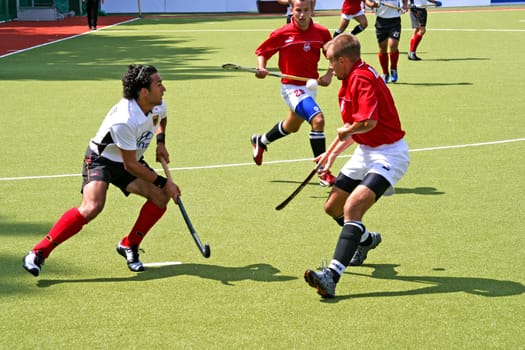The picture was taken on 24.07.05 at the international hockey match between Germany and Poland. Final score 5:0 for Germany. In the foreground you can see the Polish player Kluczynski and in white for Germany Navedo Gonlales from UHC Hamburg.