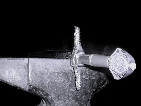The dragon slayer's weapon on an anvil. The original,of course! -) Exhibited in the Nibelungenhalle on the Drachenfels in the Siebengebirge near Königswinter/Bonn. The Drachenfels is one of the locations of the Nibelungen saga: Here Siegfried is said to be on