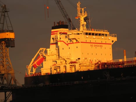 The port of Hamburg,this golden light stood just above the port for a short time. Therefore,spontaneous pictures from the hand. I didn't edit the images.