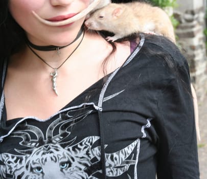 This young lady crossed my path today on my bike ride. The little animals felt "rat comfortable"" in the protection of their hair"