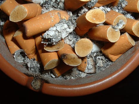 I know... Not an appetizing sight,especially for non-smokers. But that's what it looks like sometimes... my ashtray -)