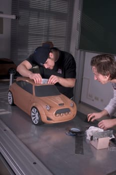 1:4 model of a mini made of industrial plastelin,facelift Study of the students of the State Technical School for Porcelain and Industrial Mold Design