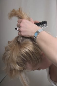 Putting on an updo - continuous shooting 1 of 9