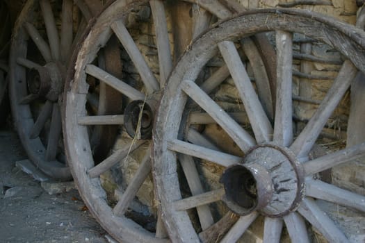 Old wagon wheels in a barn
