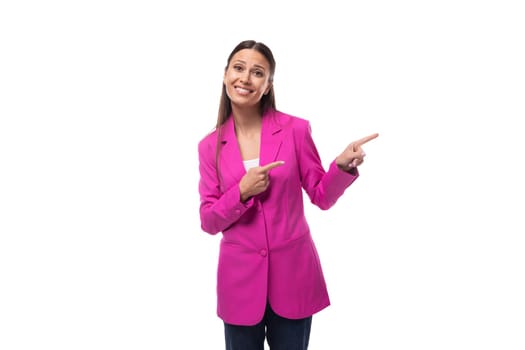 young well-groomed slender woman with black straight hair dressed in a crimson jacket holds her index finger up.