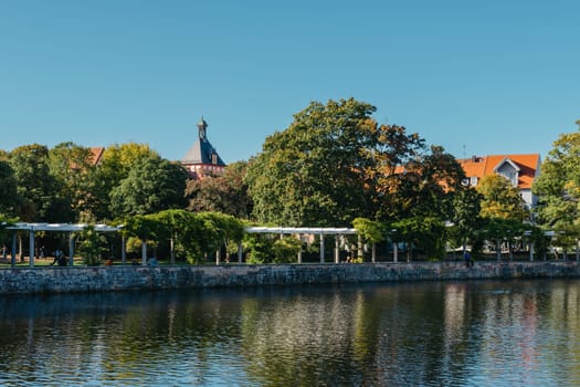 On An Old European City Bietigheim-Bissingen In Germany. the City Park of Bietigheim-Bissingen, Baden-Wuerttemberg, Germany, Europe. Autumn Park and house