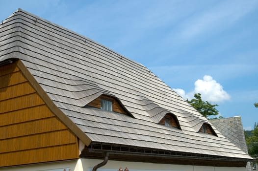 Crippled hipped roof with shingles Olbernhau Germany